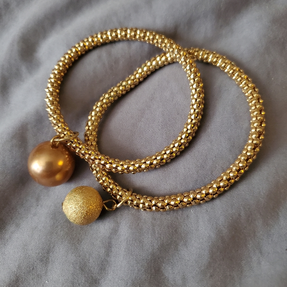 Gold tone bracelets two